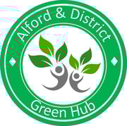 Green and white circular logo of Alford and Di